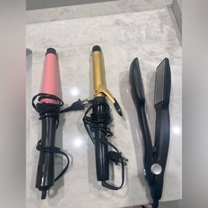 Set of Three Hair Styling Tools - wand, curling iron and straightening iron.